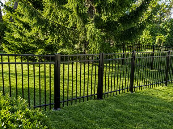 Black aluminum fence and walk gate